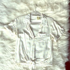 White with yellow poka dot crop top.